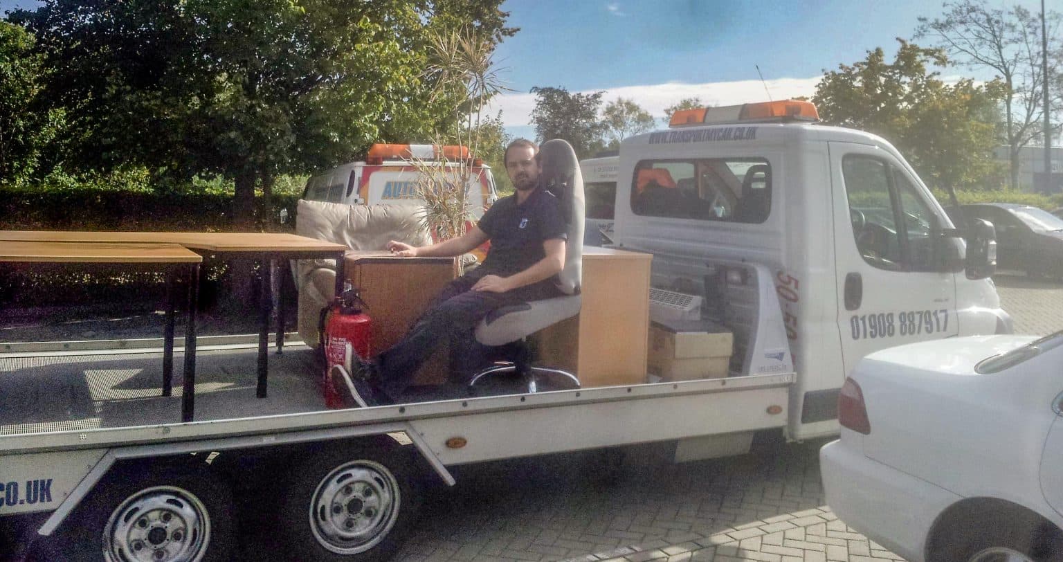 Moving office furniture with a forklift