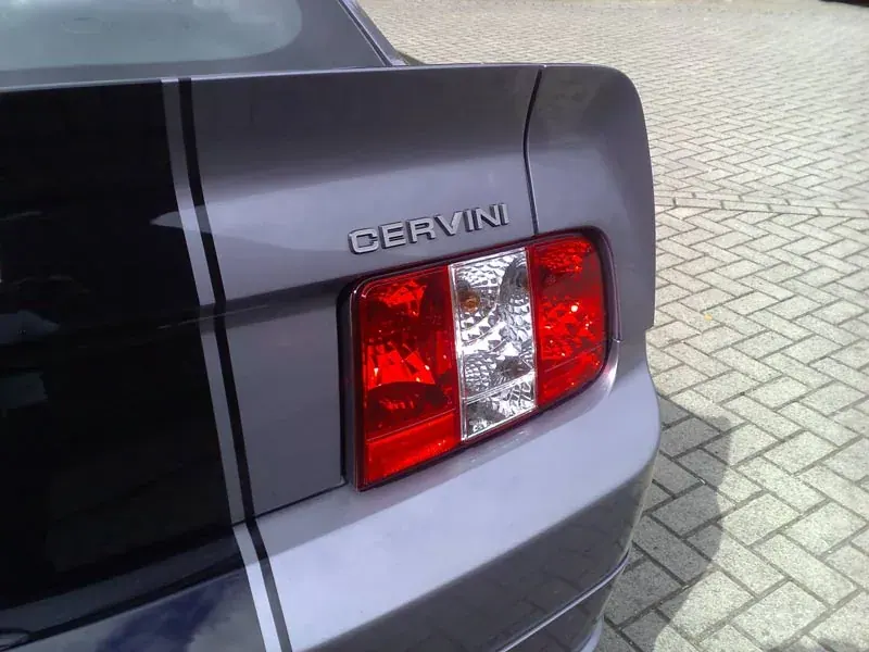 Replacement rear cluster with a clear centre section on a silver Cervini Mustang