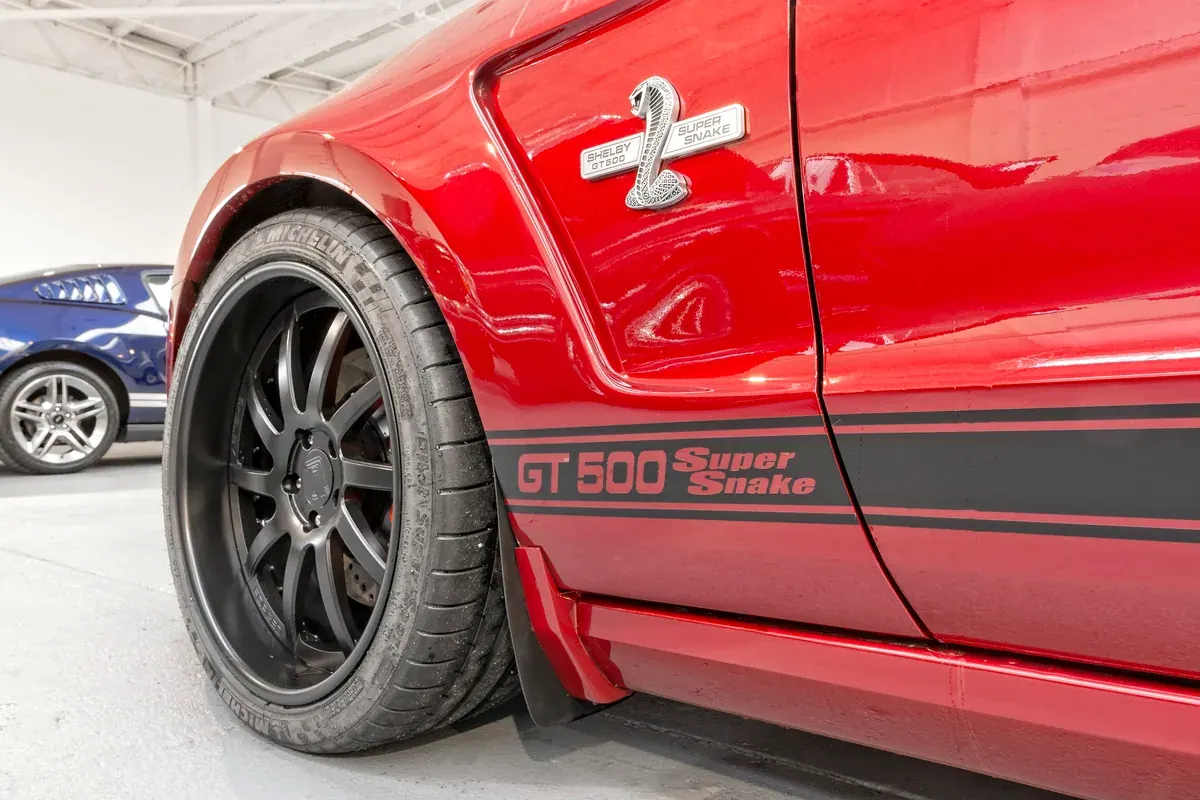 Red Shelby GT500 Super Snake front wing with original badges and no drilled side repeater